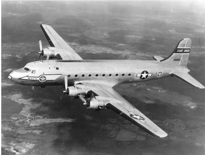 Black and white photograph of a United States Air Force C-54 Skymaster during flight