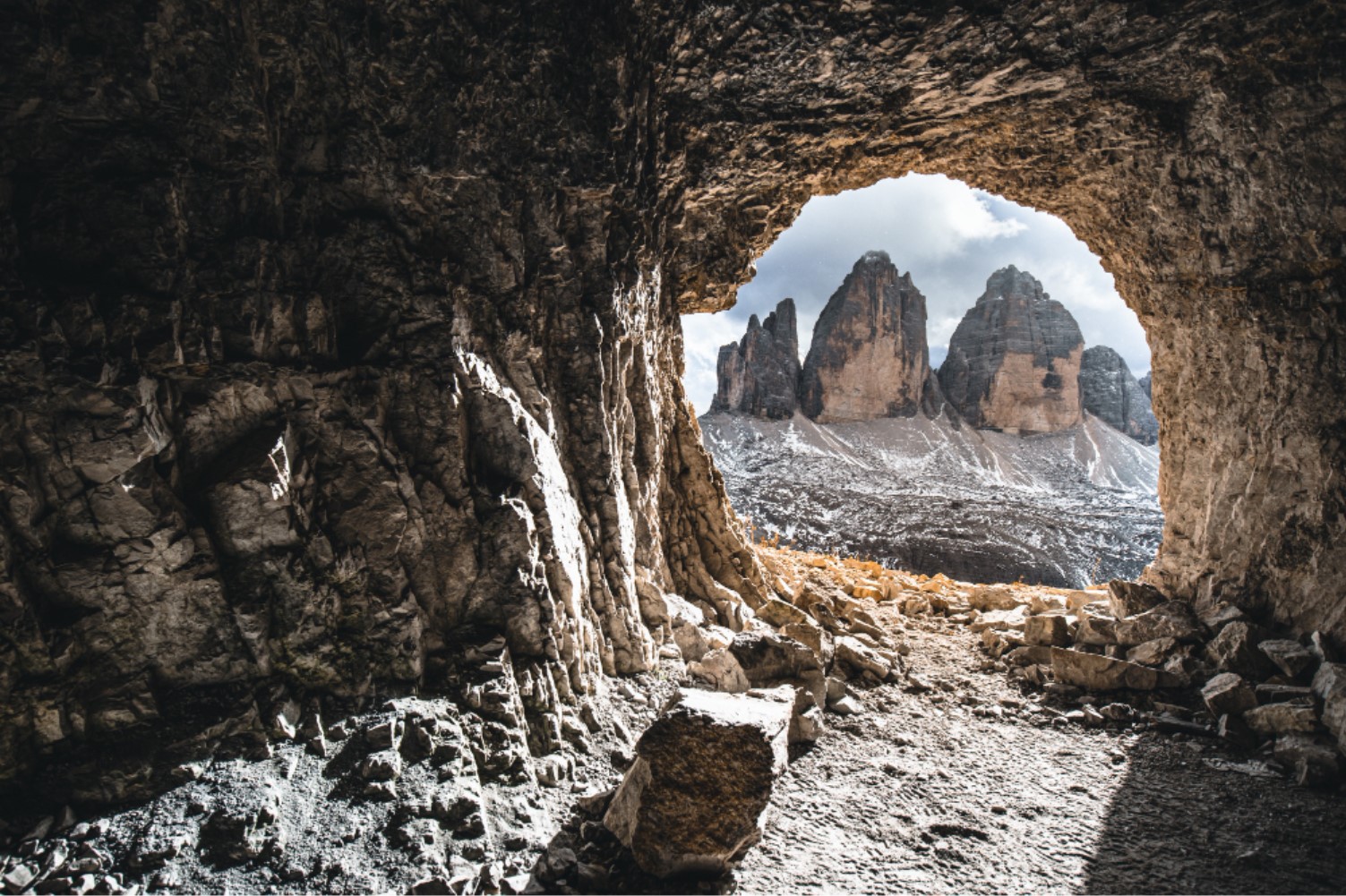 Entrance to a small stone cave which leads onto an underground tunnel