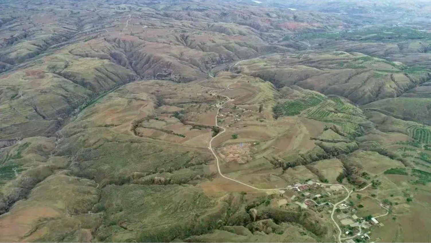 Birdseye view of the ruins of the ancient Stone City of Houchengzui