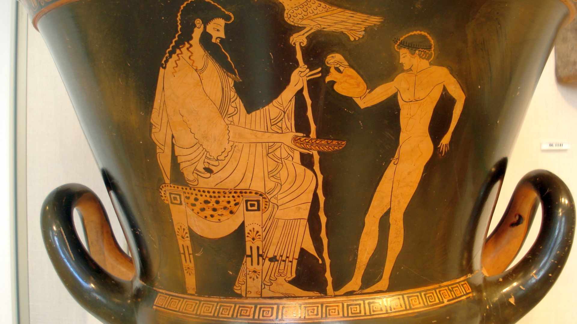 Zeus depicted sitting on a vase.