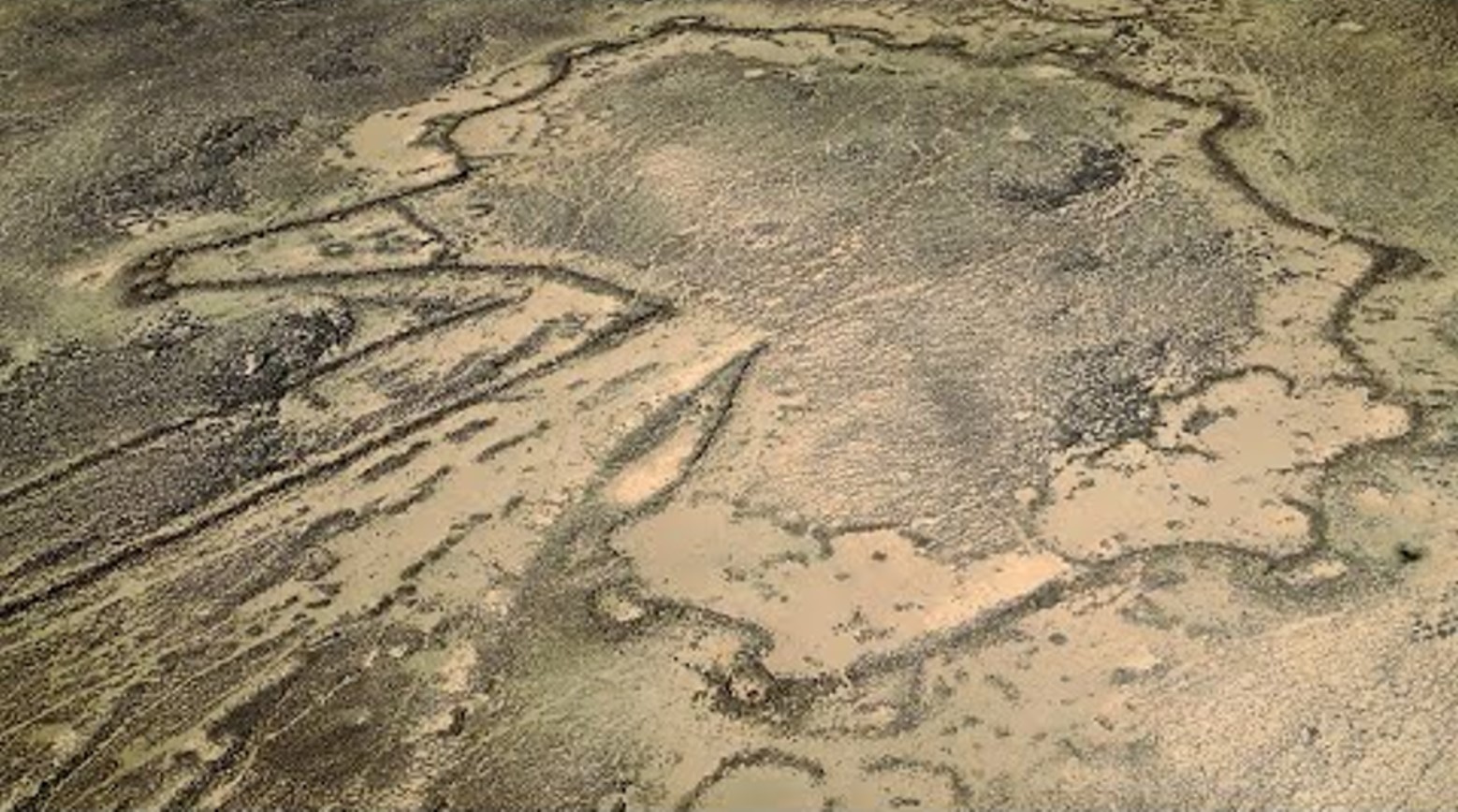 Aerial view of a desert kite, or walls created by prehistoric peoples to hunt animals, in Africa