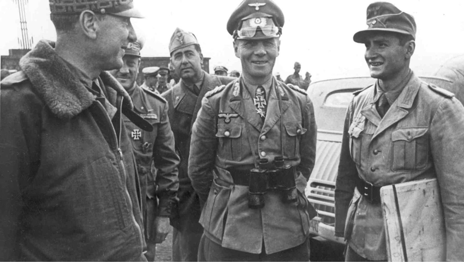 Nazi General Erwin Rommel is photographed next to other members of the German military.