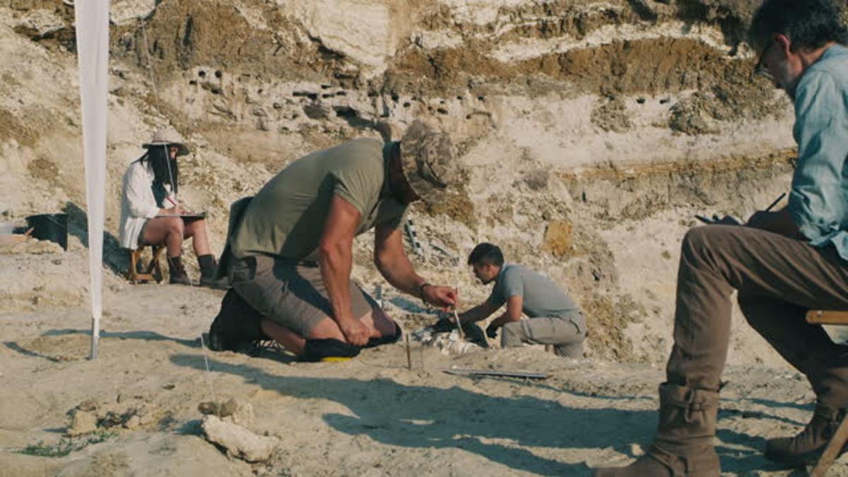 Archaeologists at work in the hot sun