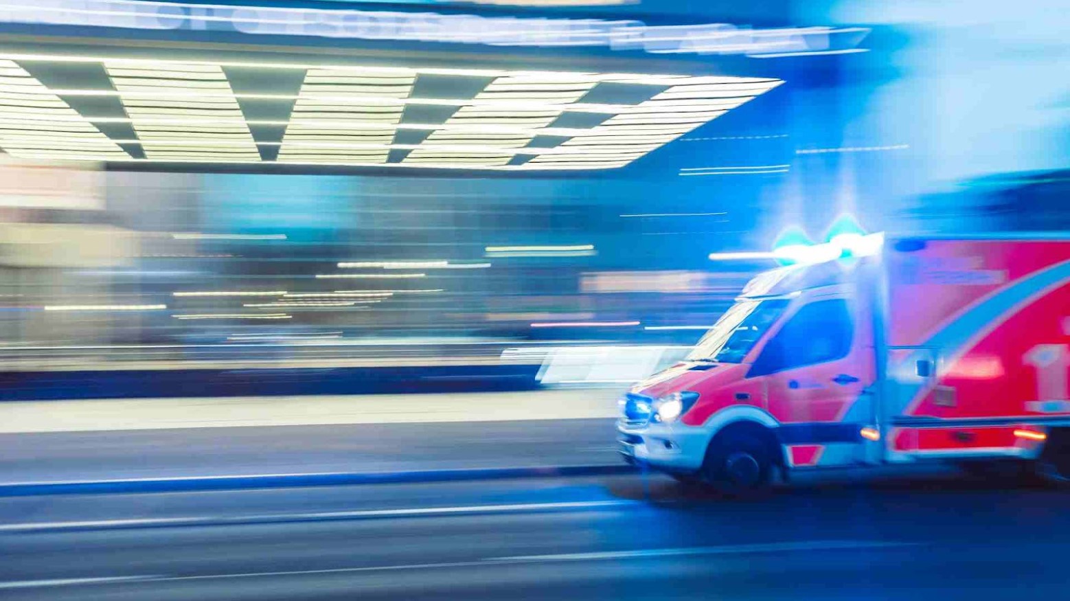 An ambulance rushing to a hospital.