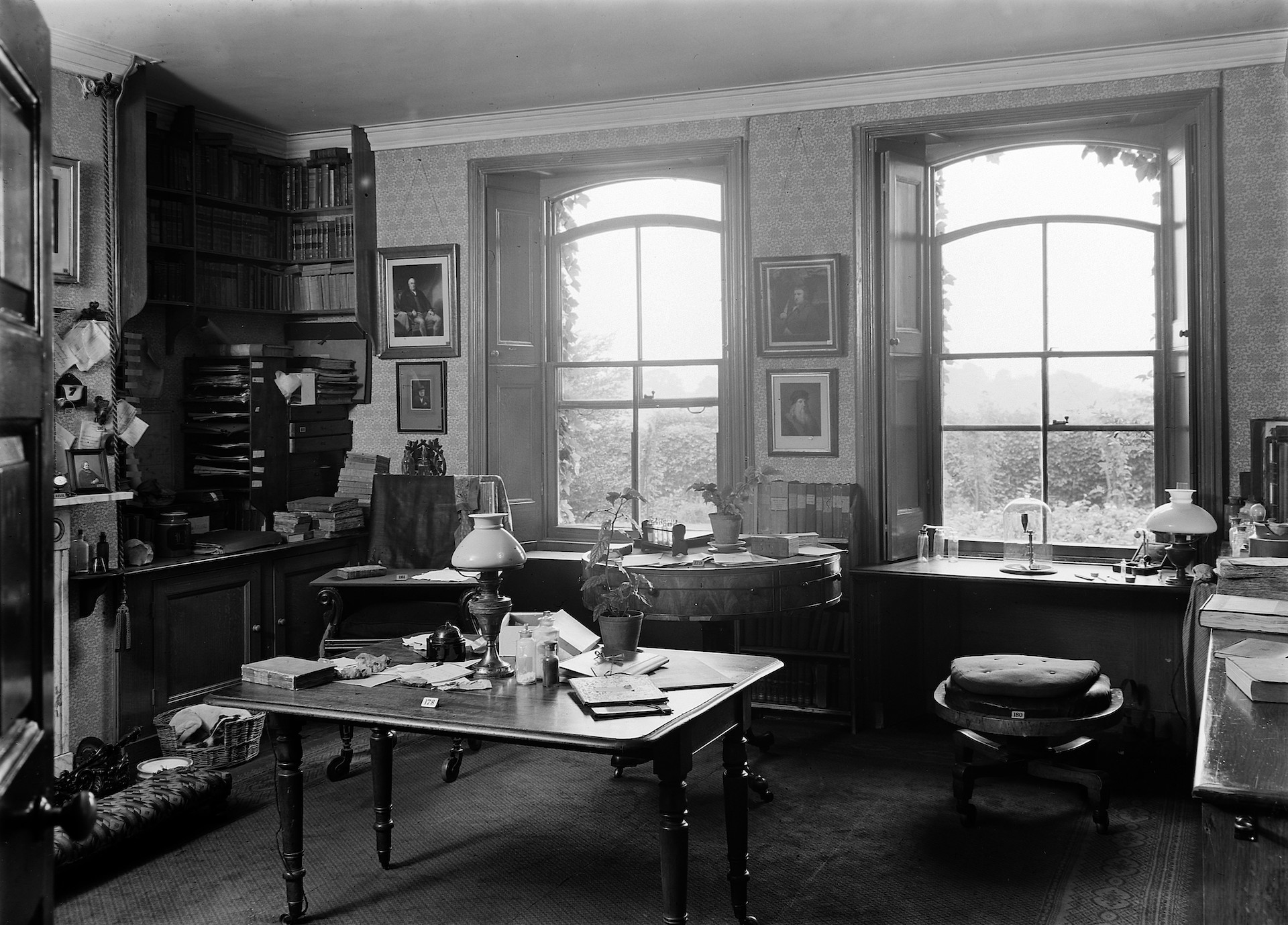 A grayscale image of the interior of Charles Darwin's personal study