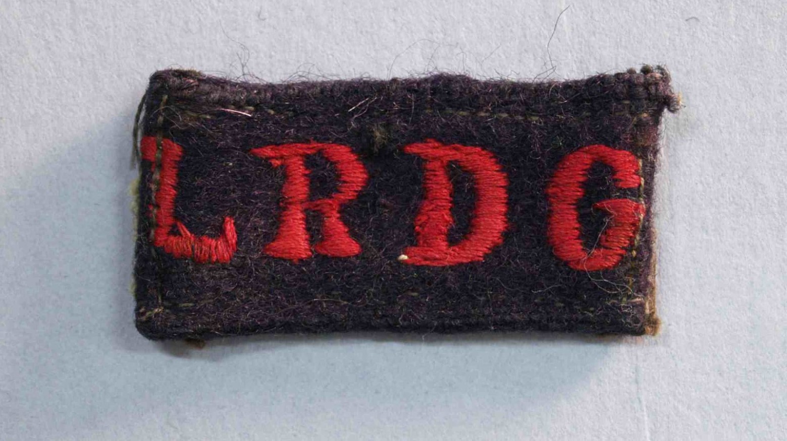 A photo of a LRDG badge.