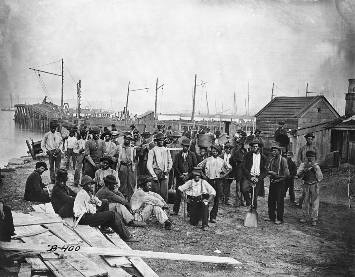 A group of freed African American slaves along a wharf during the United States Civil War
