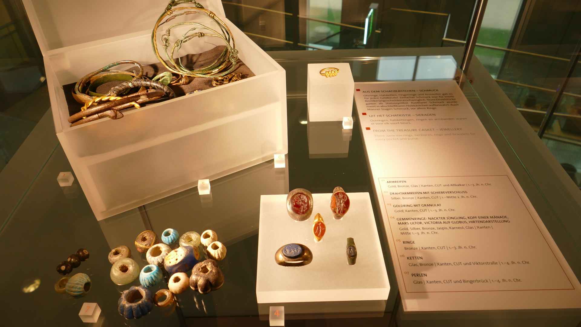 An exhibit of Roman jewelry in a museum.