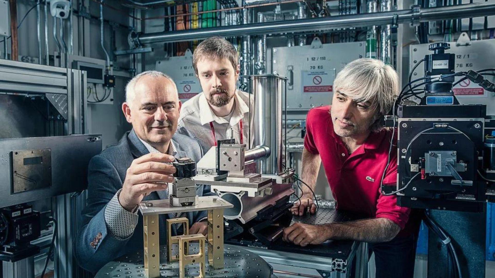 Brent Seales, Seth Parker, and Michael Drakopoulos at the particle accelerator.