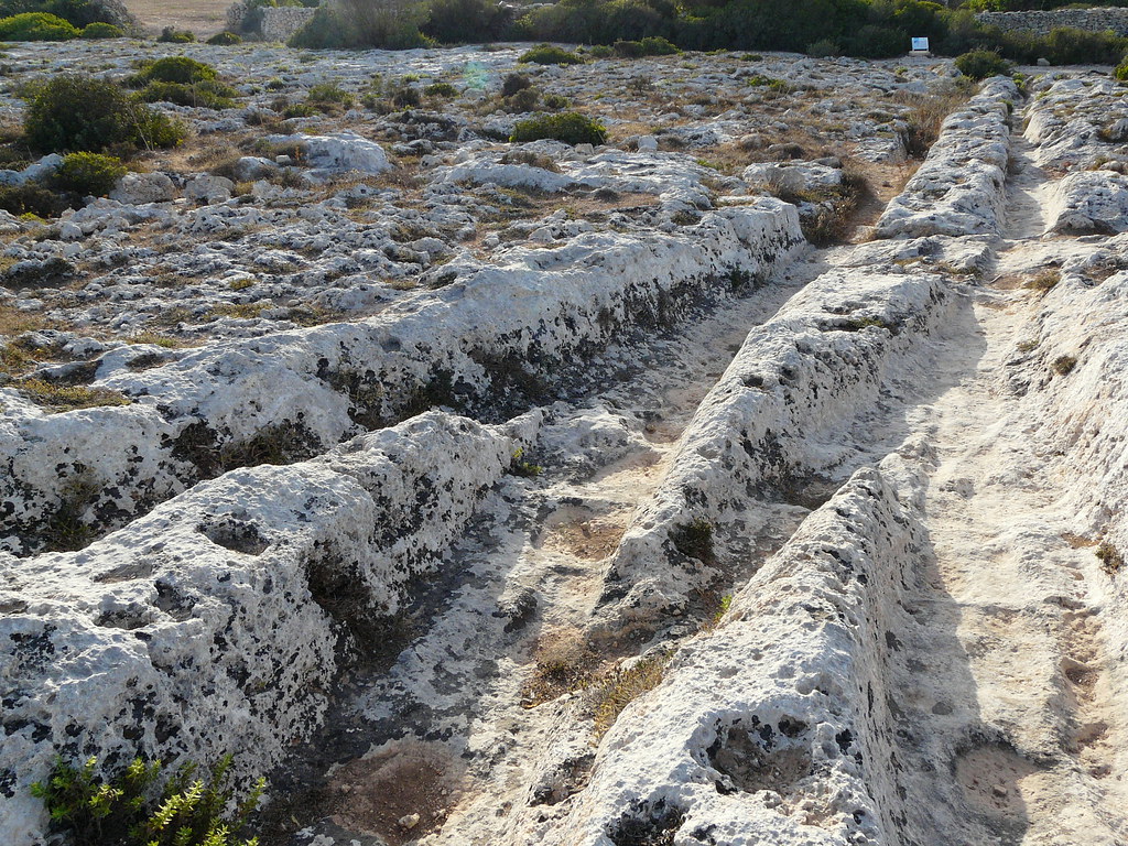 Deep and overlapping cart ruts made in limestone in Malta