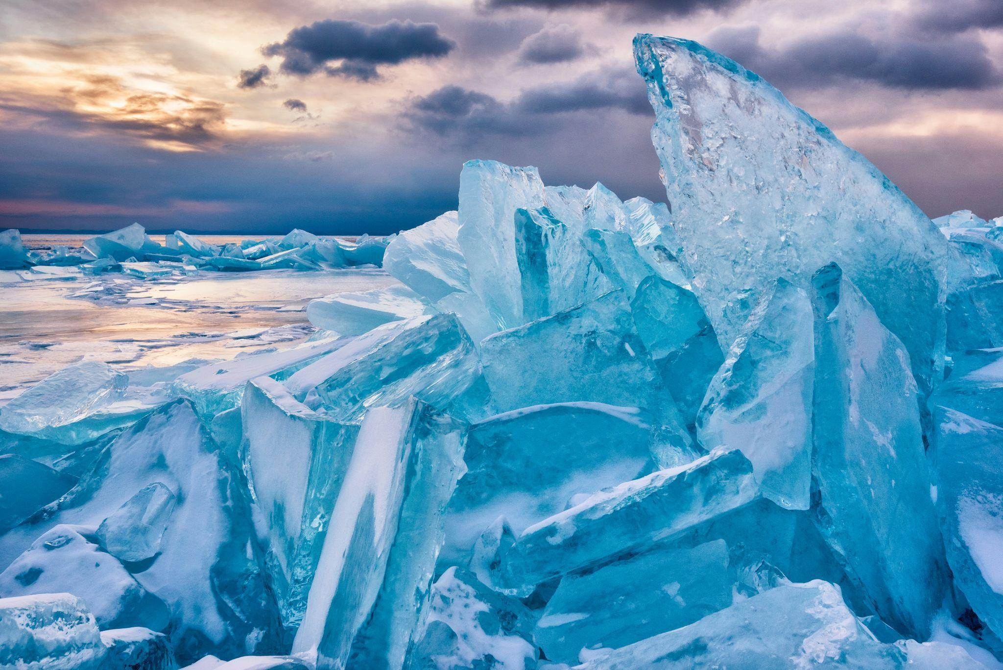 Large blue and white ice forms on Lake Baikal, Russia.