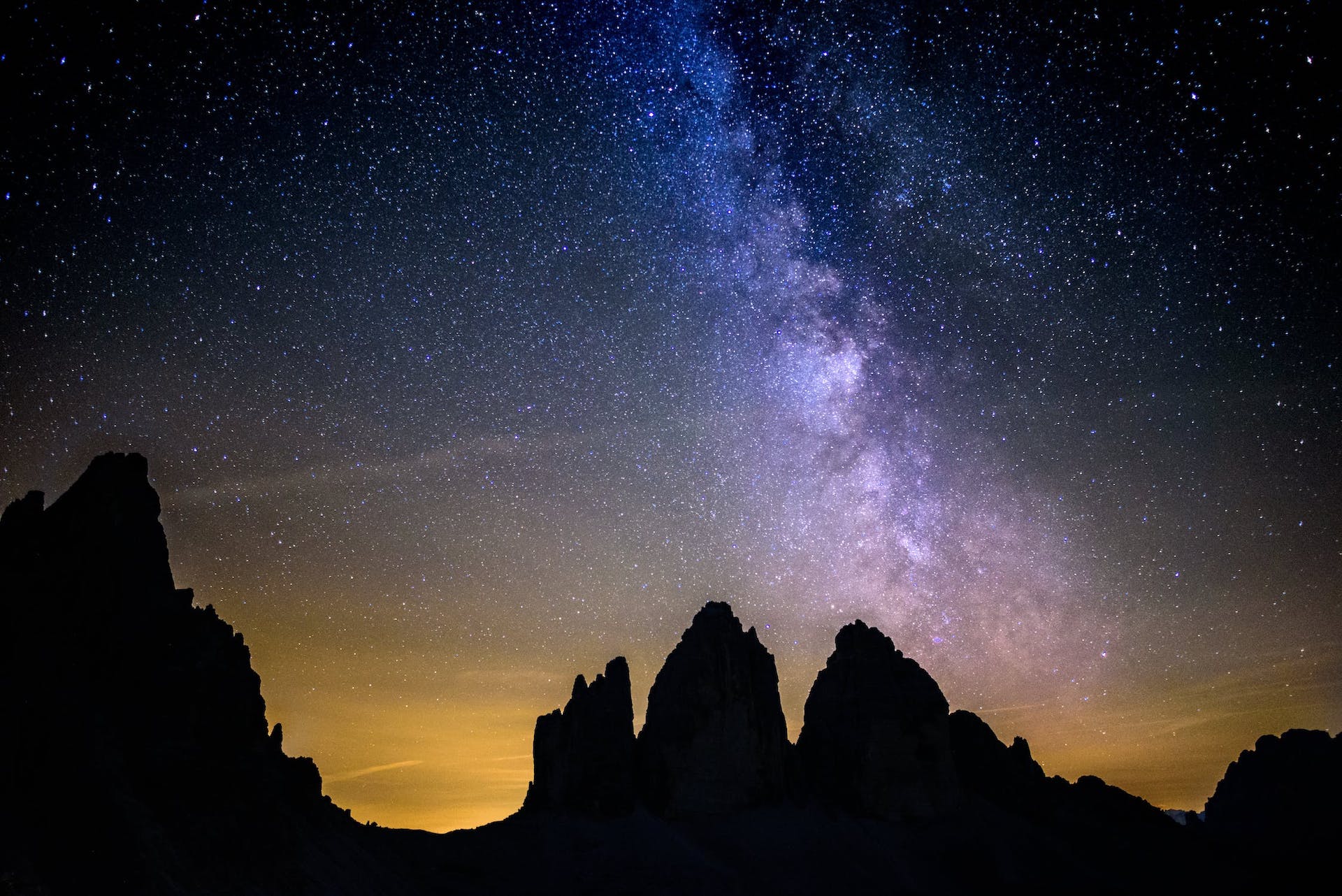 The Milky Way above rocks in the evening sky
