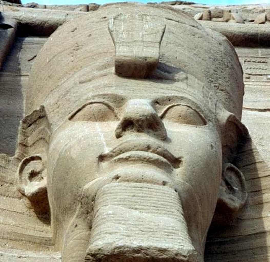 A photograph taken of a large Ramses II statue at Abu Simbel