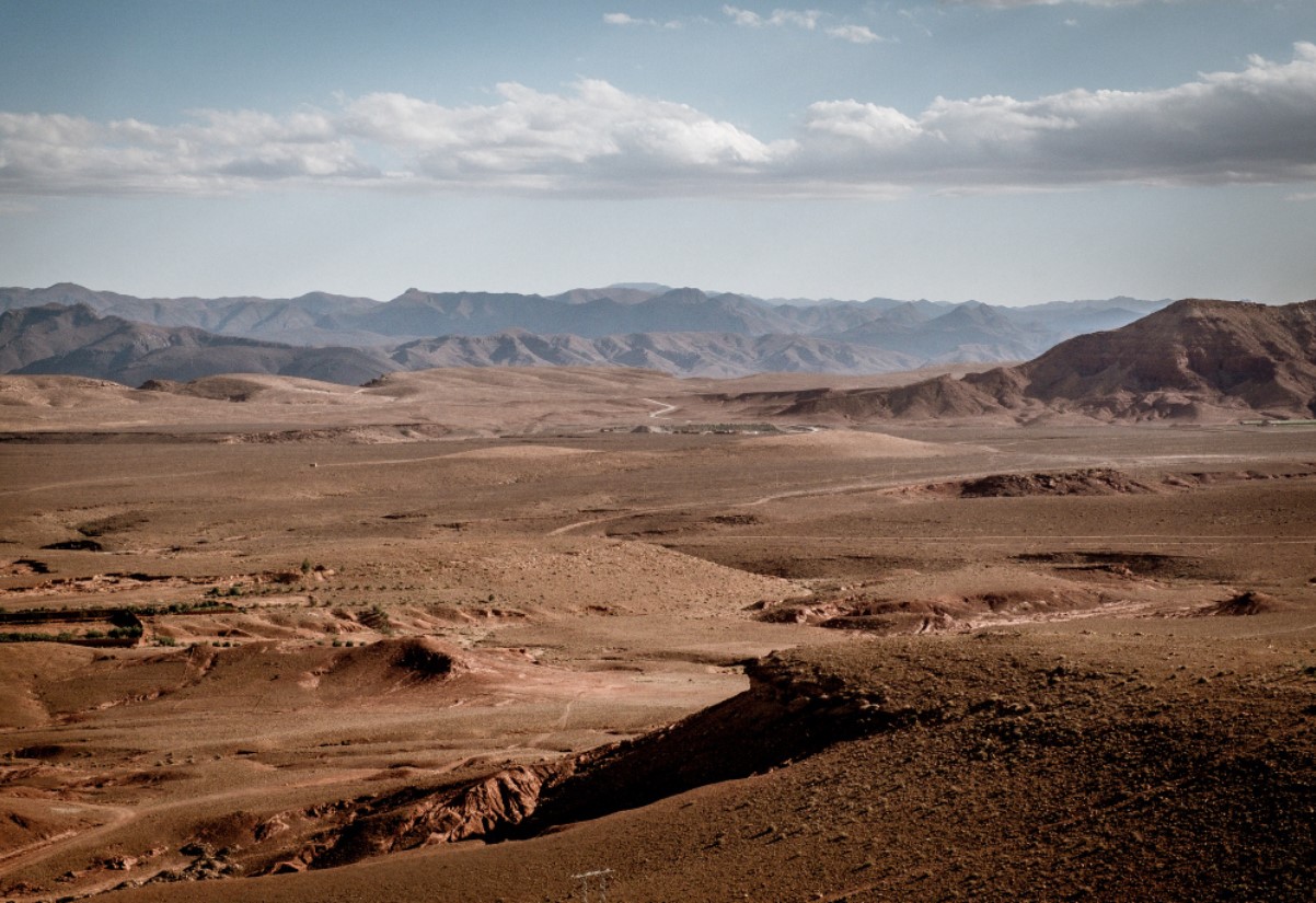 Photograph of a vast desert with little to no plants or wildlife