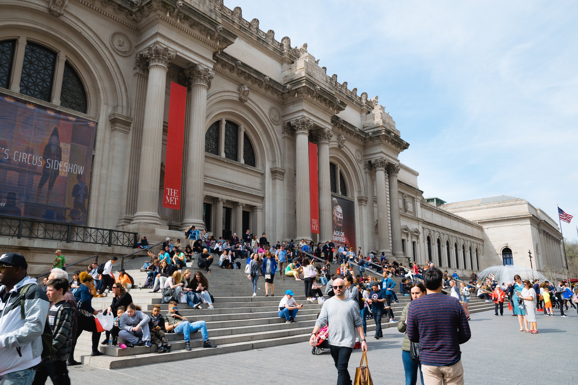 A wide shot of the exterior of the Met in New York City, NY
