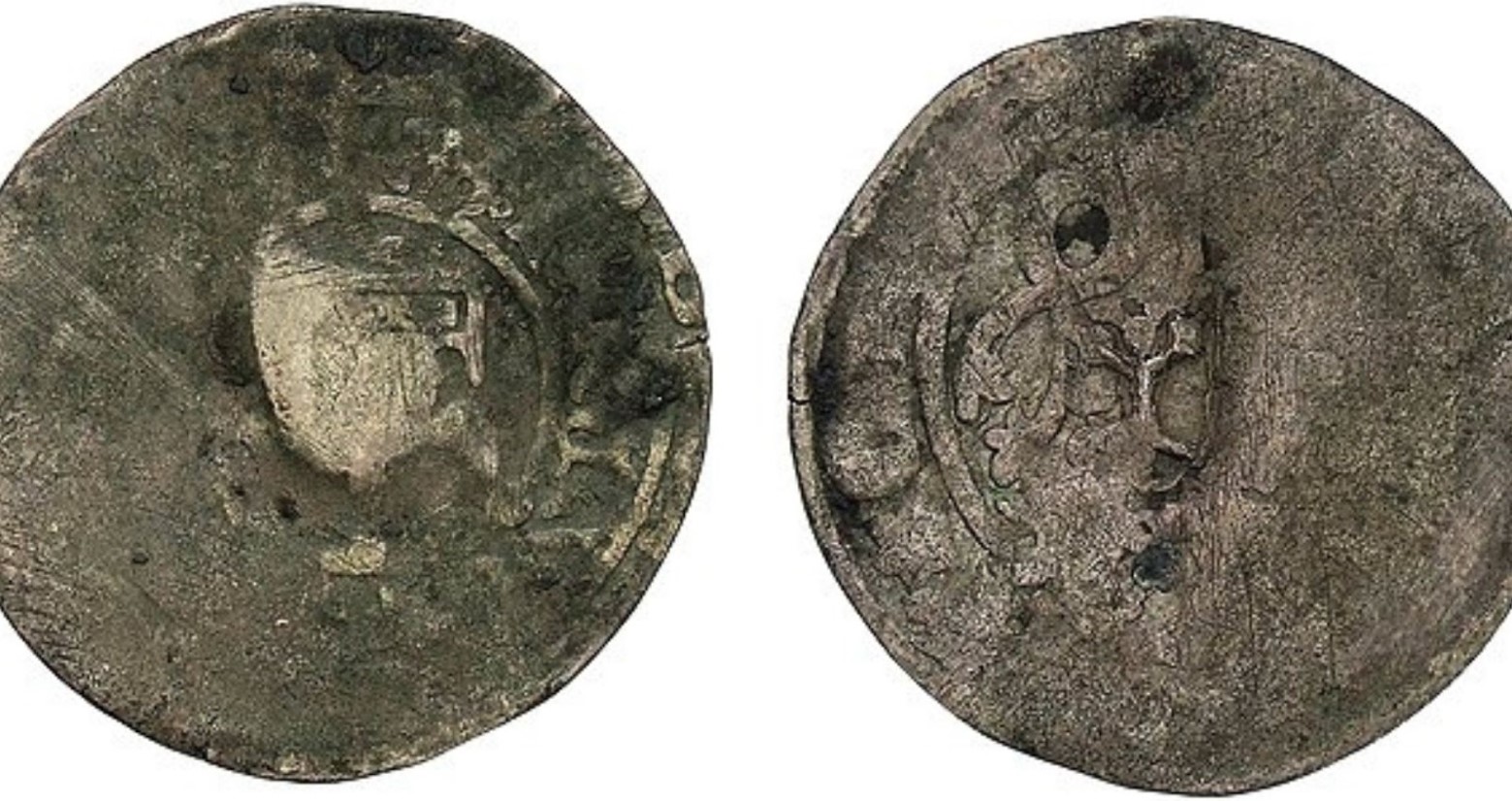 An example of some coins from the Middle Ages, however, they are not the coins that were found in Norway. Some of the print on the coins can be seen, but most of it has rubbed away.