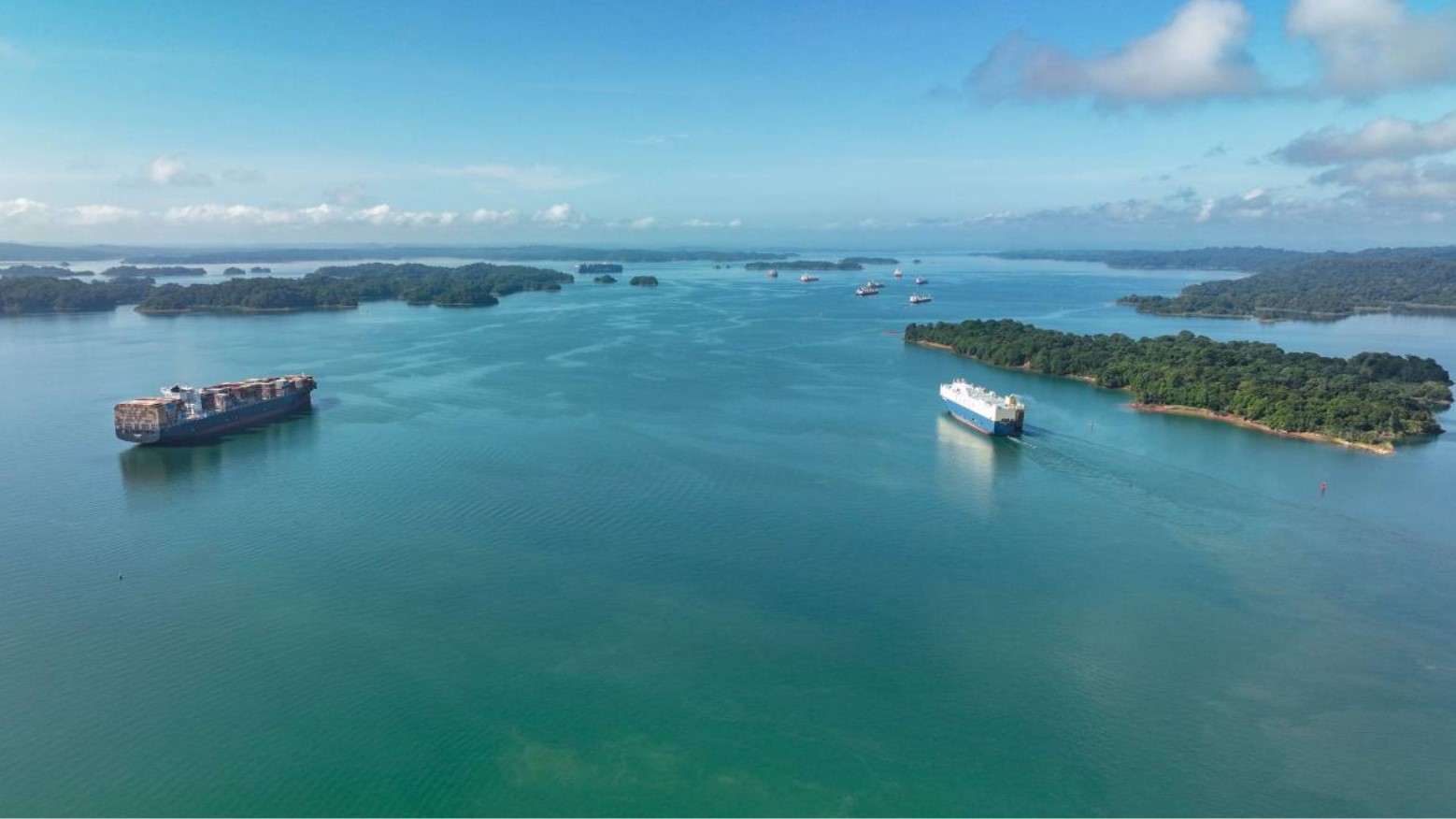 View of boats crossing through the Panama Canal, through Lake Gatun, and Barro Colorado Island