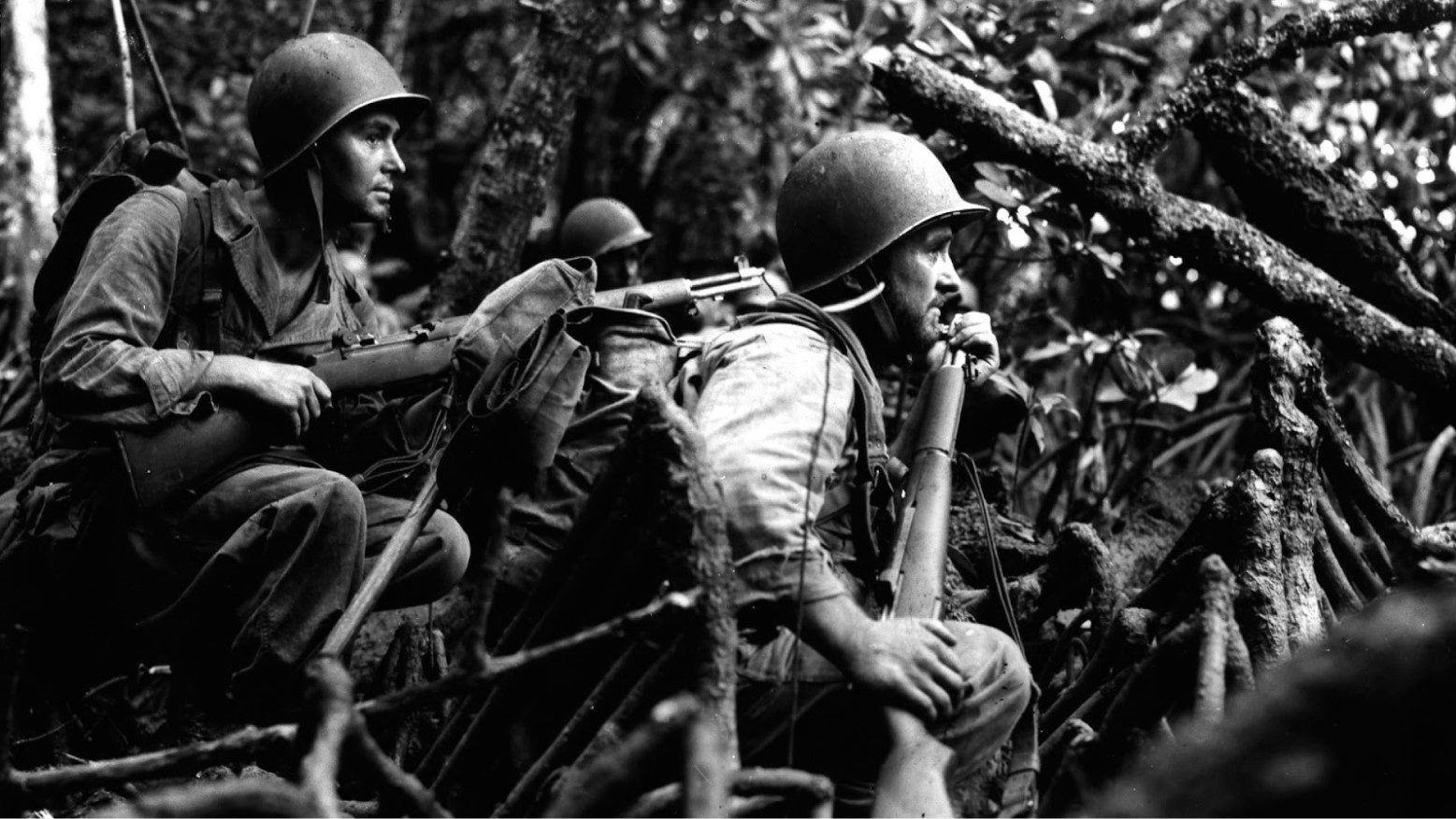 Two U.S. soldiers in World War II in a black and white photo.