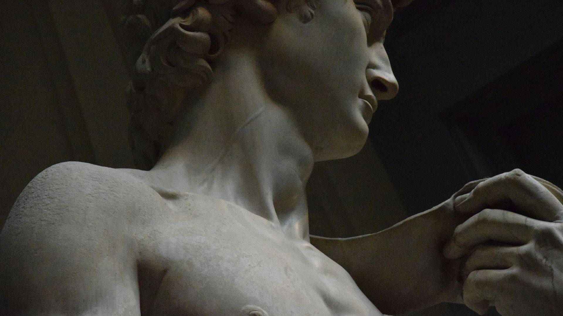 A close-up of Michelangelo’s David statue.
