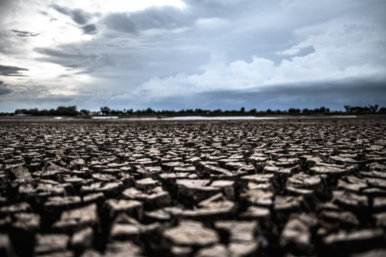 Photograph of a dried-up lake after a drought