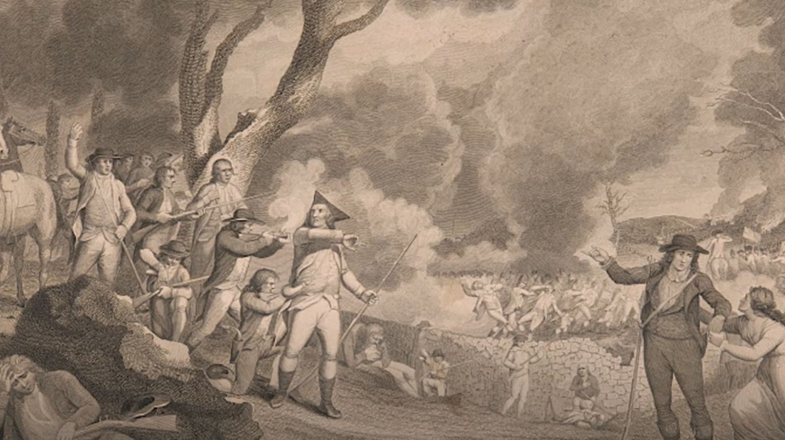 A greyscale drawing of the American Revolution. Some of the men are Minute Men. One man on the right is being held onto by a woman. There are soldiers at the top of a hill pointing guns at the soldiers below.