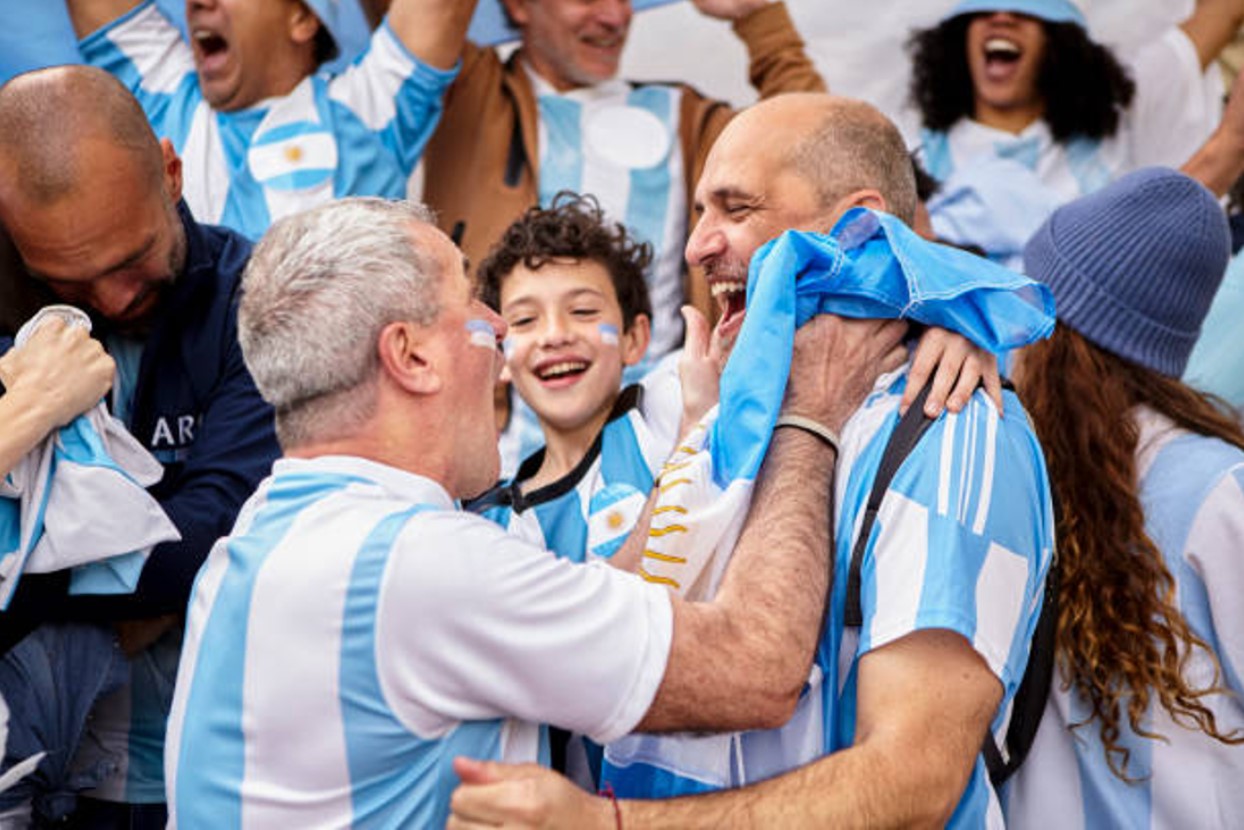 Argentinian football fans celebrate a team win