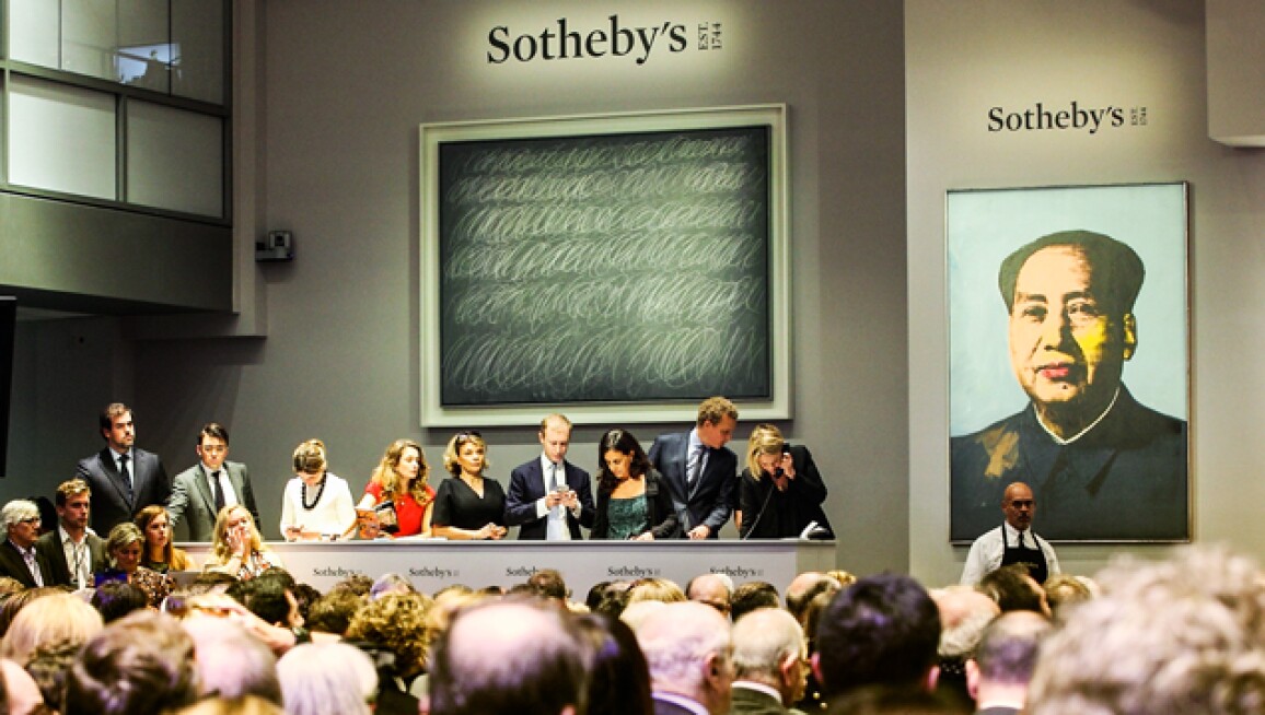 A wide shot of an art auction in Los Angeles, CA