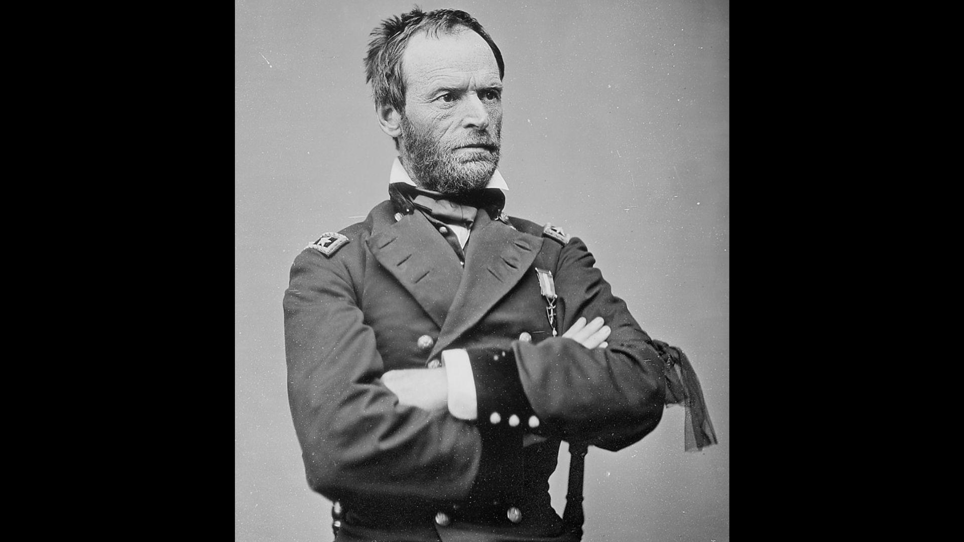 Black and white photograph of William Tecumseh Sherman crossing his arms across his chest