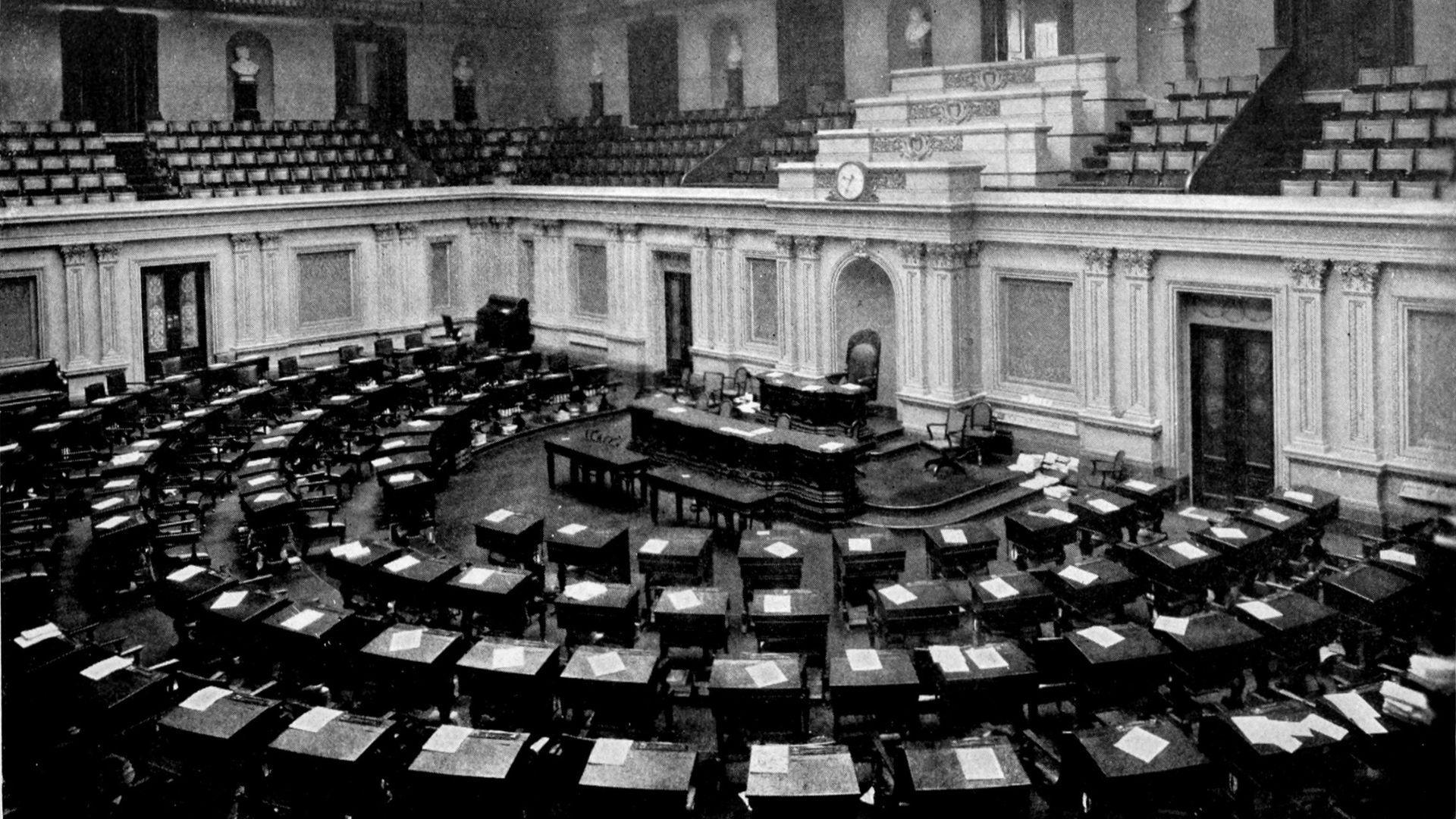 A black and white 1921 photograph of the U.S. Senate chamber.