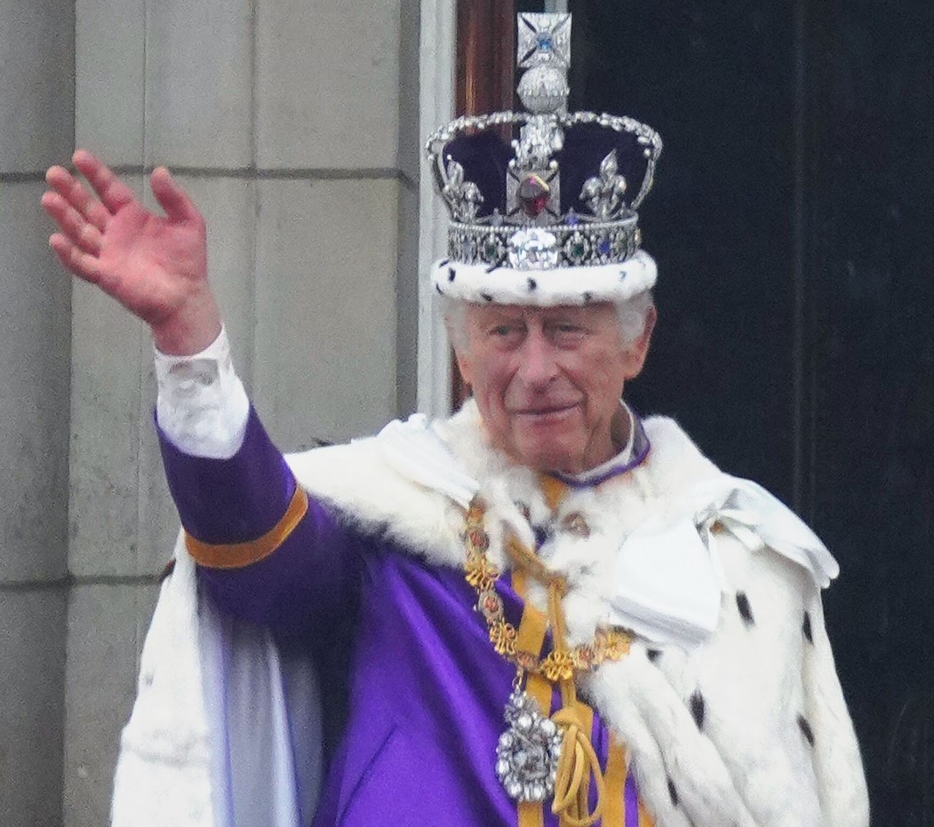 An image of King Charles wearing his royal attire