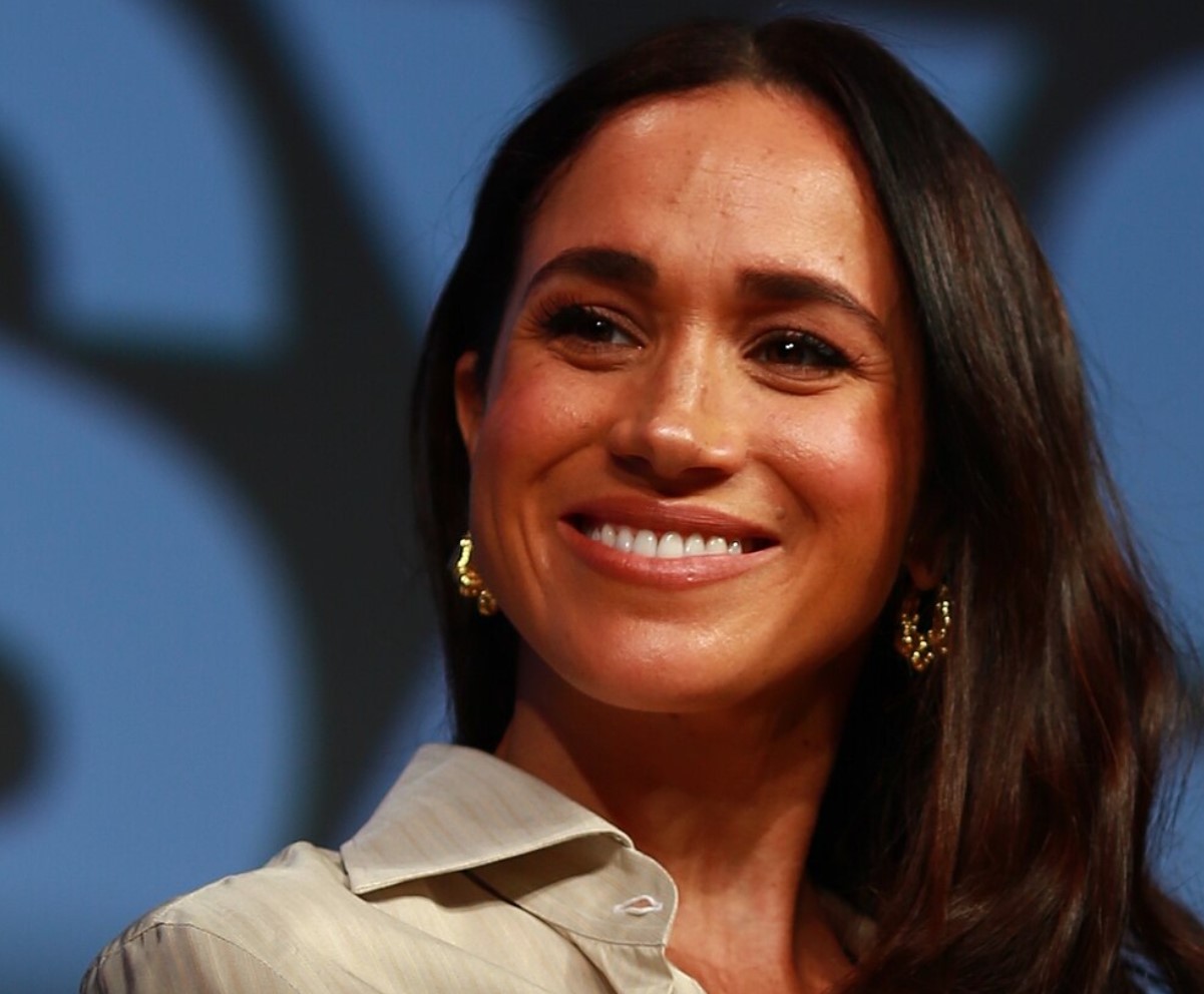 An image of Meghan Markle pictured smiling during an event