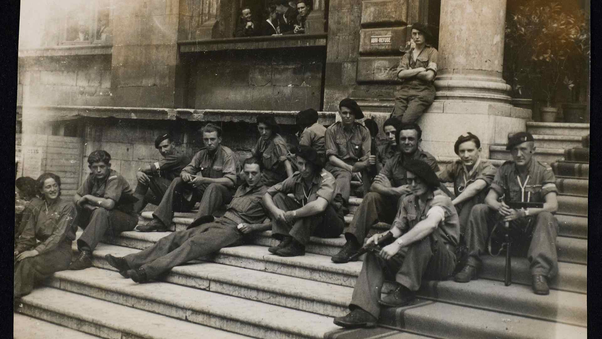 Fighters wait for Charles de Gaulle in France in 1944.