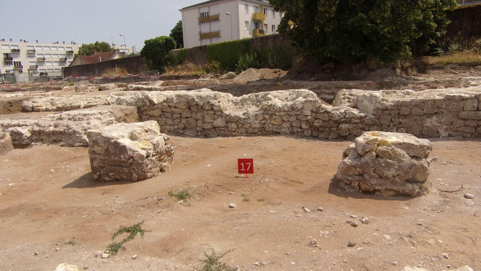 An archeological dig, with numbered tags, of the Beaumont Abbey in Tours, France.
