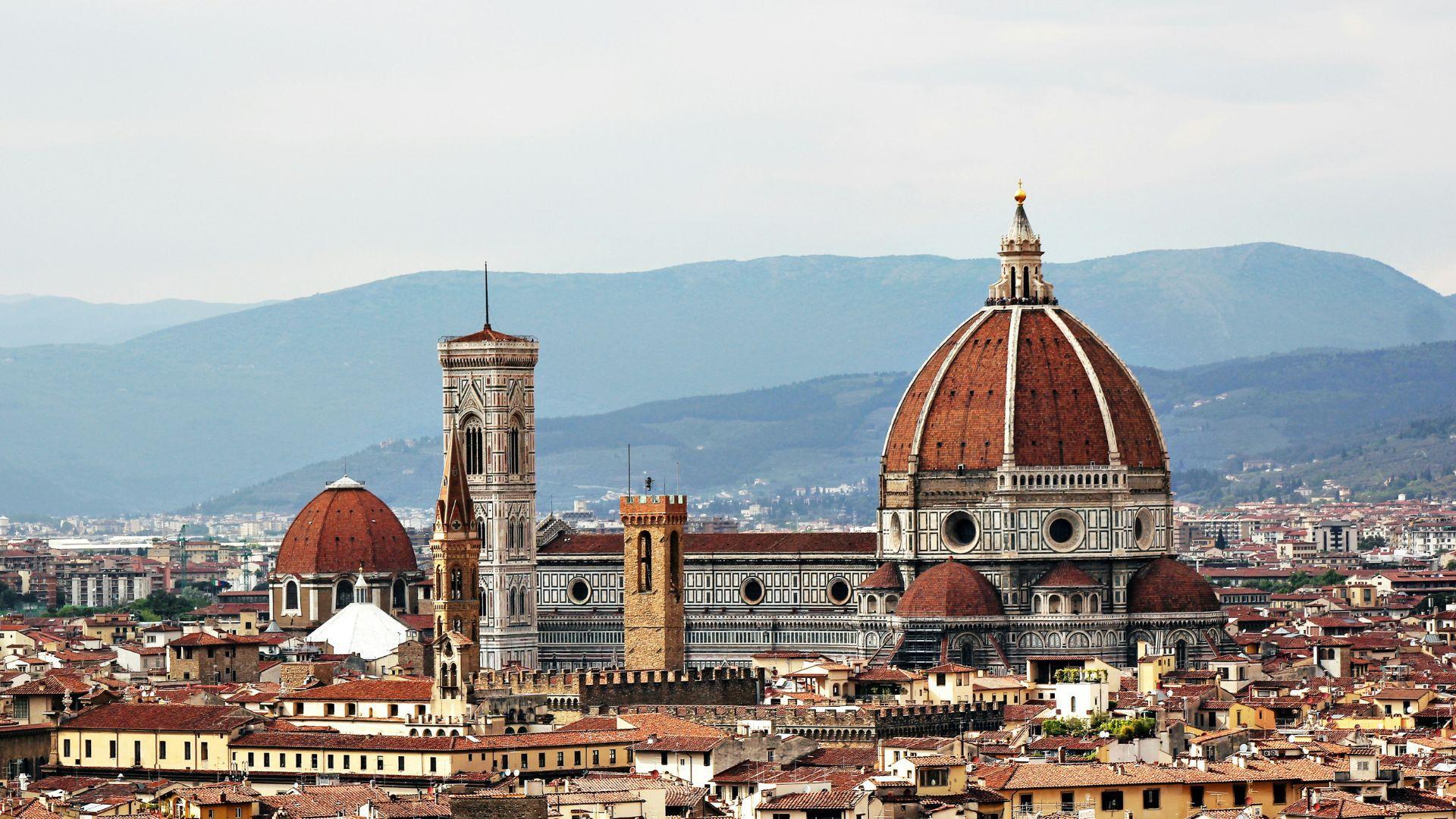 Large, old buildings seen in an aerial view of Florence, Italy.