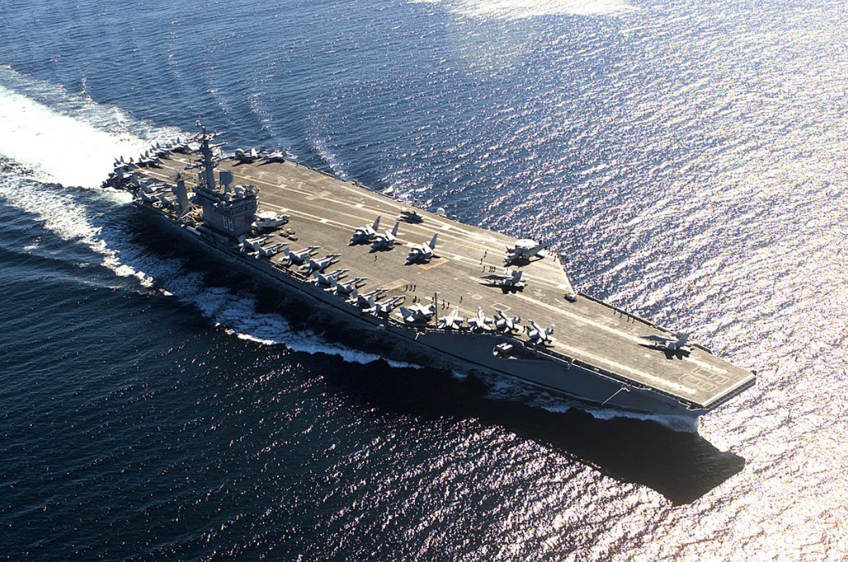 An image of a large US Navy aircraft carrier at sea