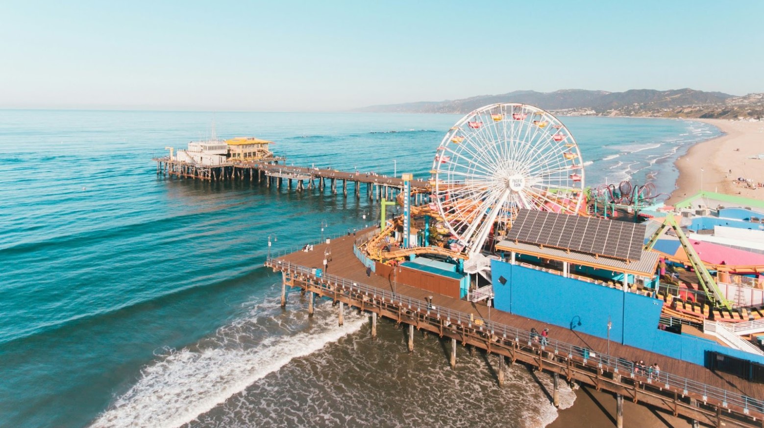 A bird’s eye view of the Santa Monica Pier seen in the daytime.