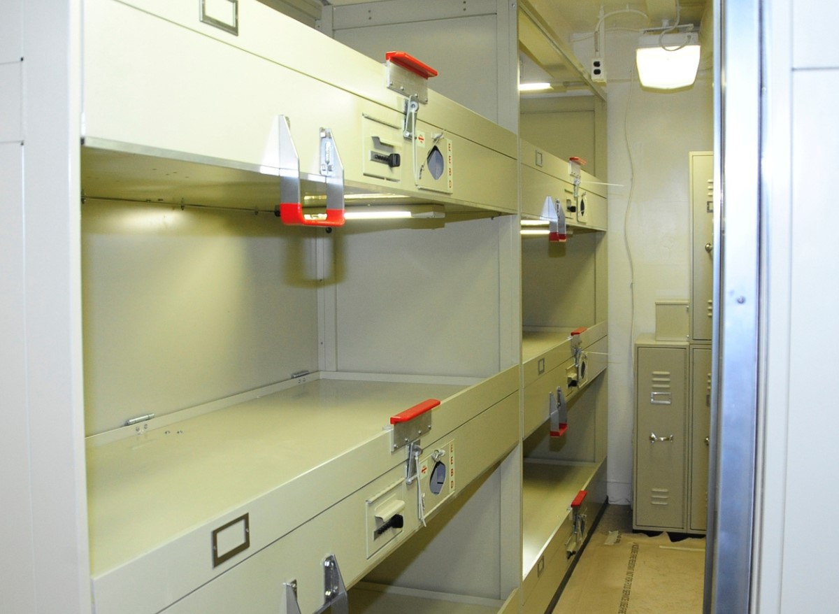 An image of rack bunk beds aboard a Navy ship
