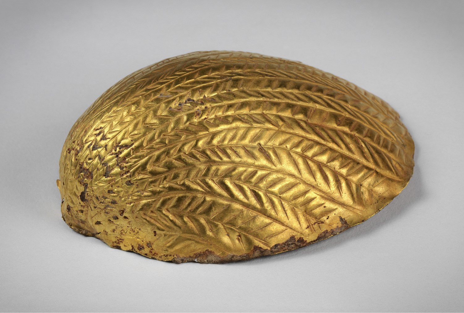 A small golden cosmetic container from the Sumerian city of Ur