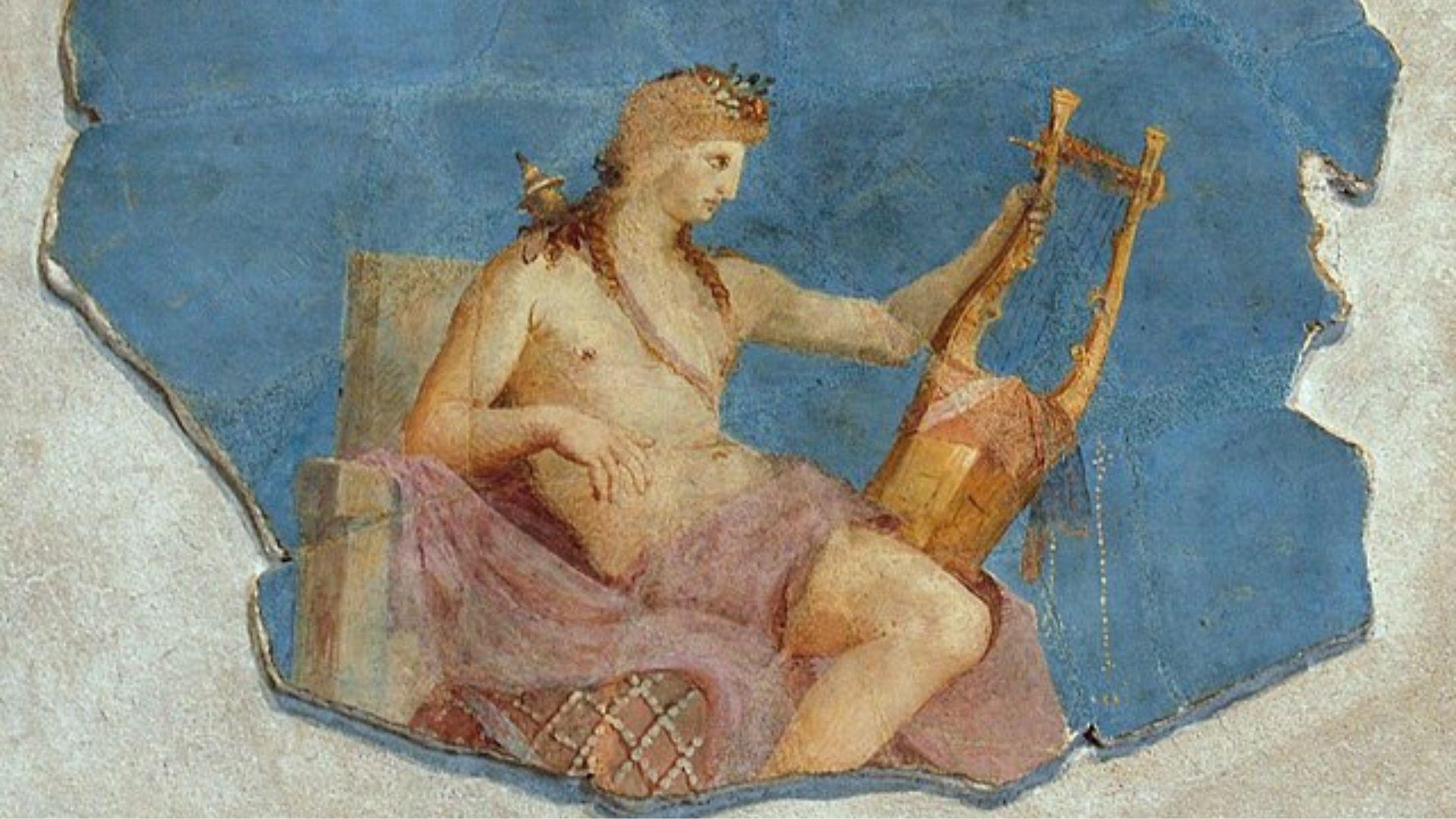 A painting of Apollo. He has a scarf wrapped around him and is holding a harp.