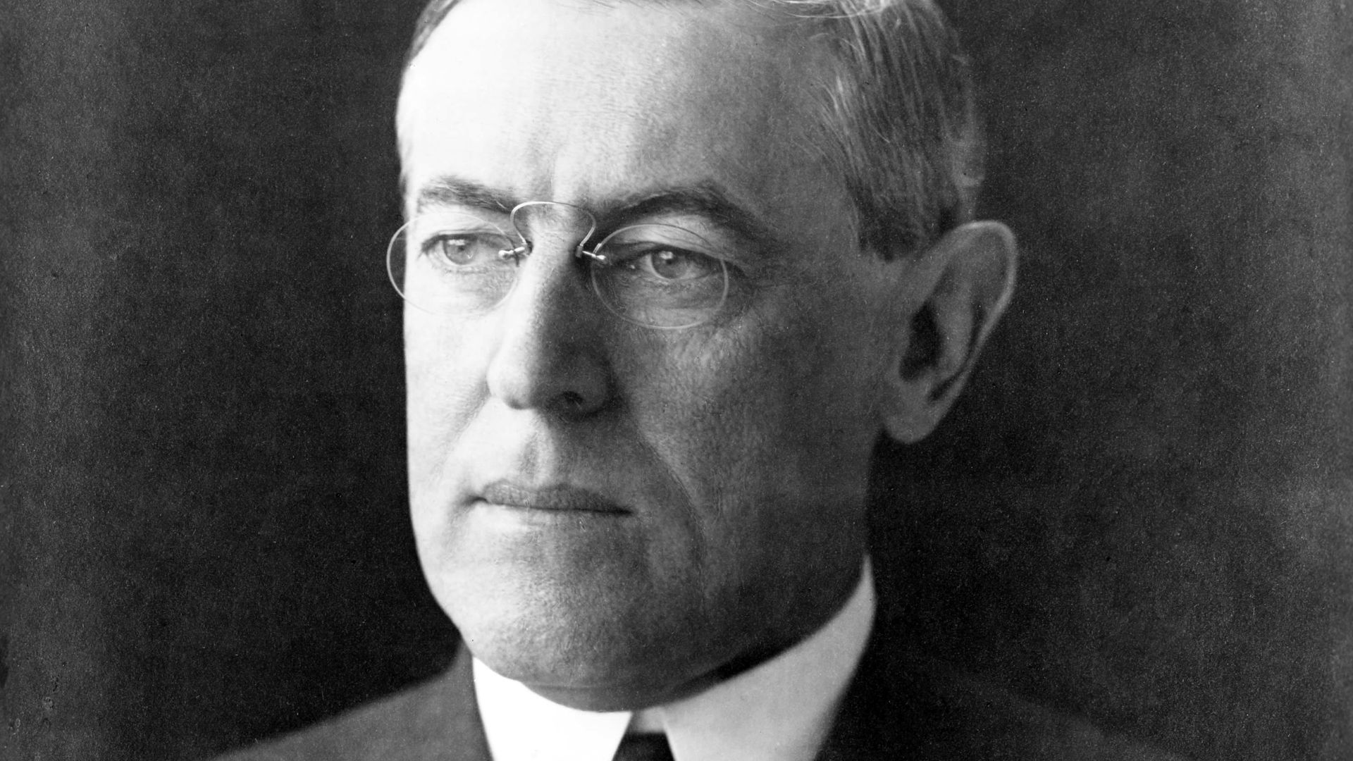 A 1912 black and white photograph of Woodrow Wilson.
