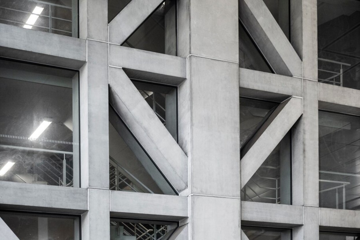 Building made out of cement and glass windows