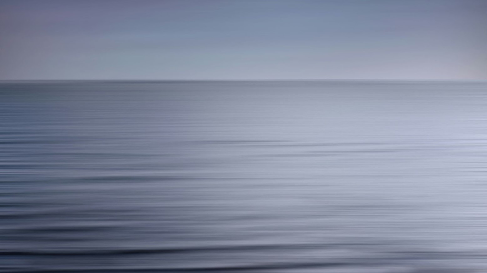 A blurry image of the Baltic Sea and the sky.