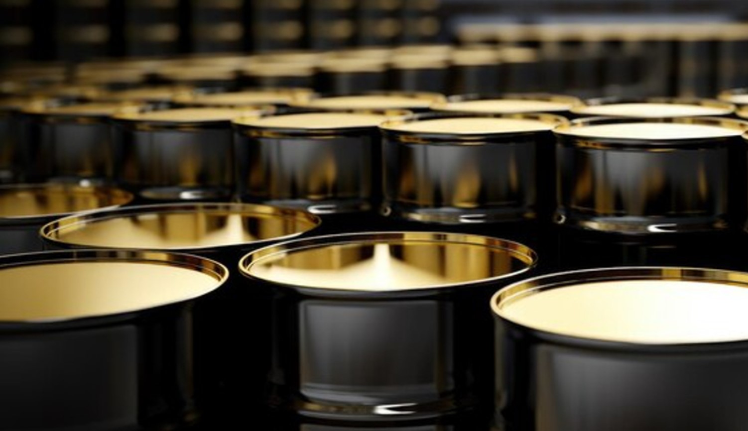 An image of several barrels of oil in a storage facility