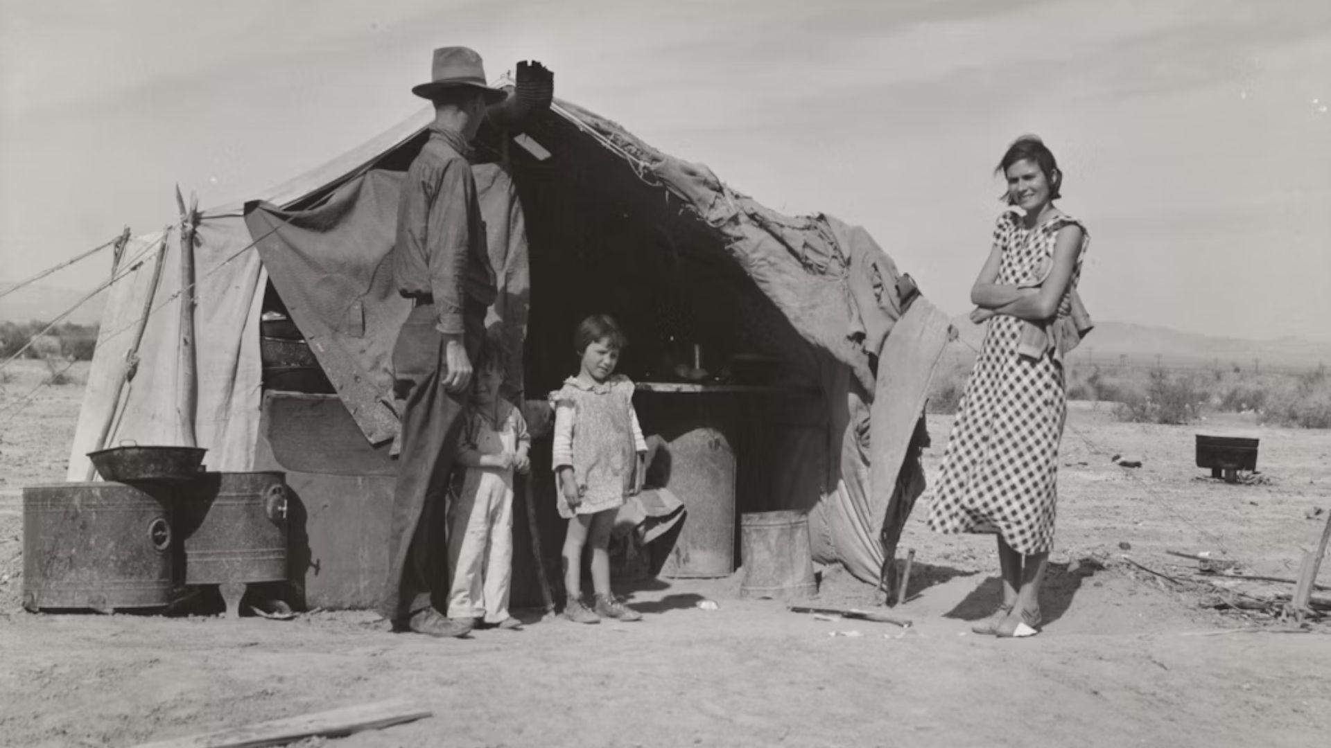 An American family sleeping in a tent during the Great Depression