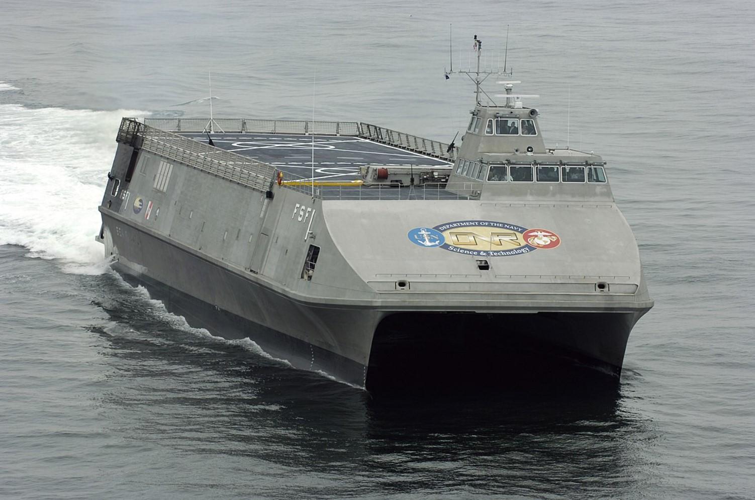 An image of a small Navy ship at sea