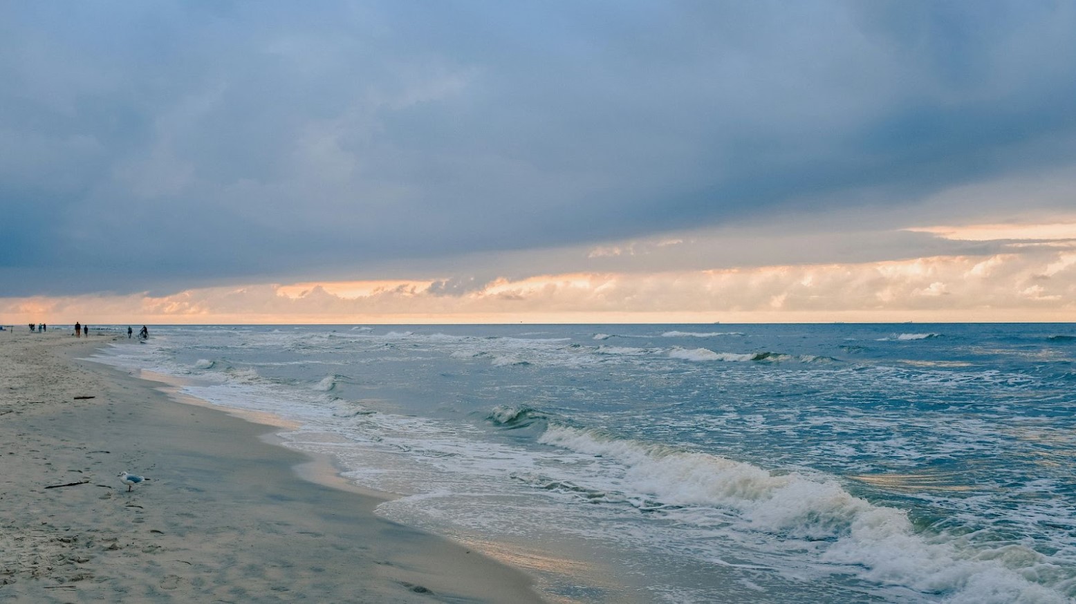 A beach on the Baltic Sea seen during sunset.