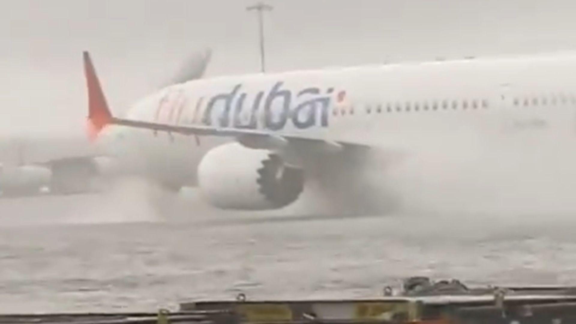An image of a plane landing at Dubai airport during the flooding.