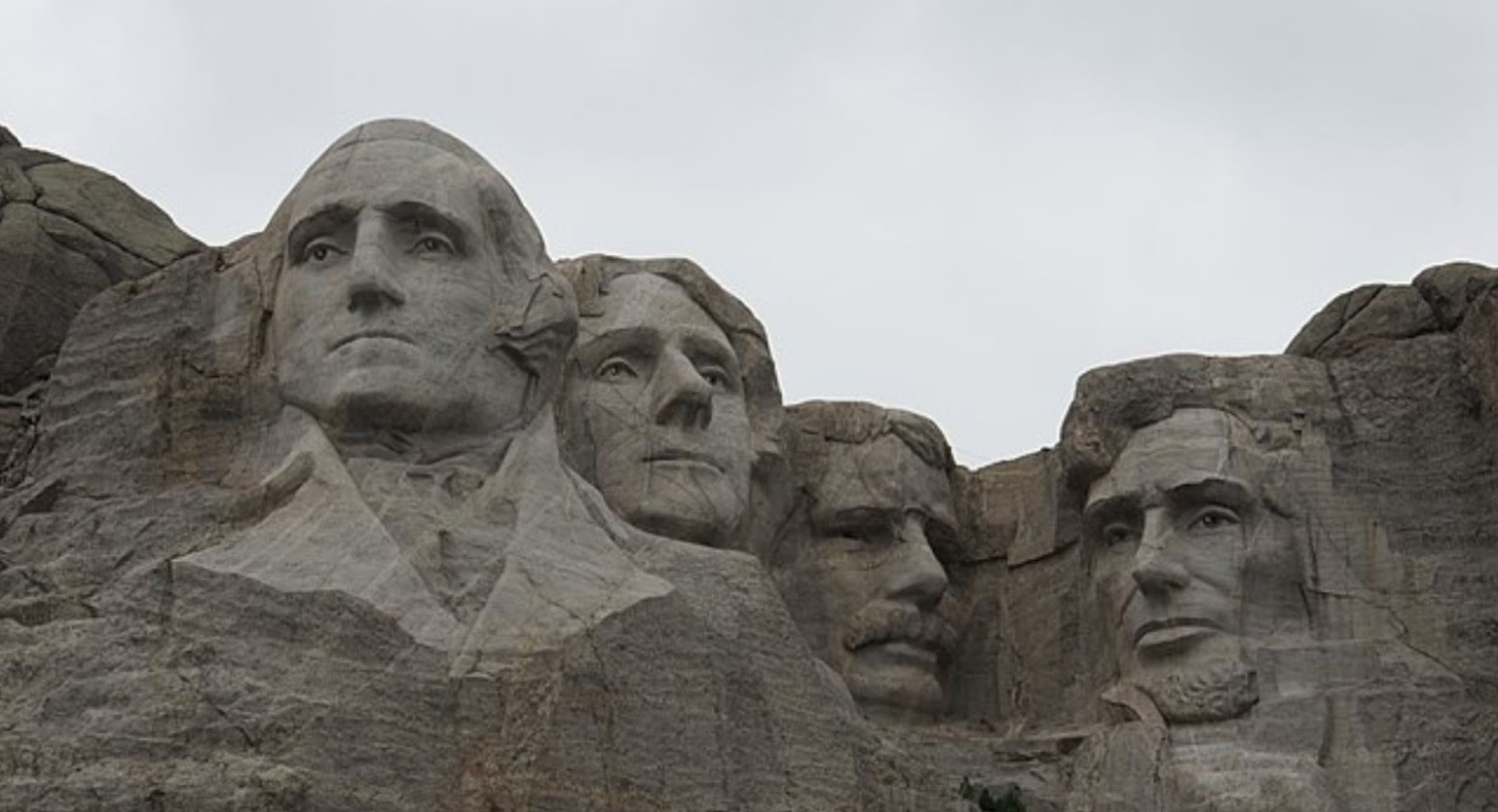 Mount Rushmore with the Founding Father’s faces on the side of the mountain.