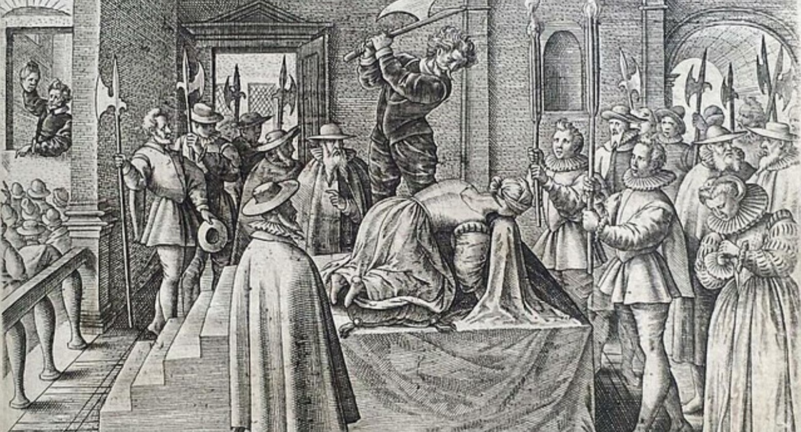 A black and white print of the beheading of Mary Queen of Scots. She is kneeling down, and a man is standing above her, holding an axe. The room is full of spectators.