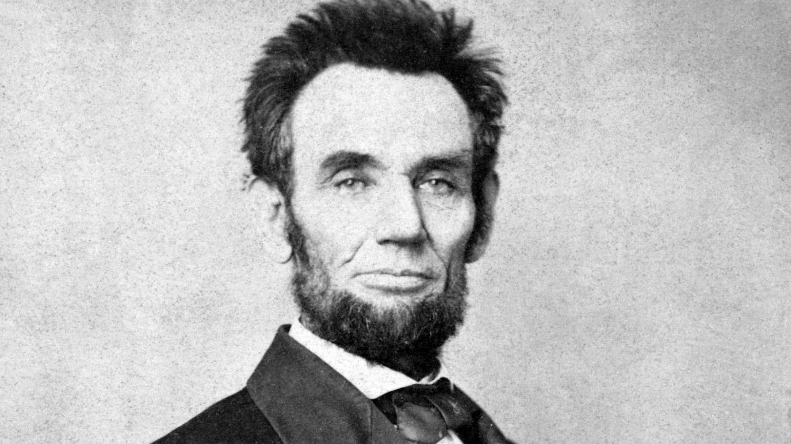 An 1865 portrait photo of Abraham Lincoln.